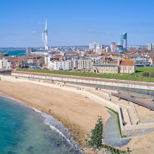 promenade beach front blue sea and blue skies 