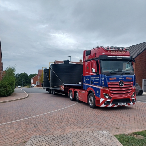 Picture of a truck with new tanks on the back.