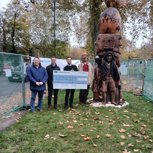 Presenting a giant cheque to an artist. 