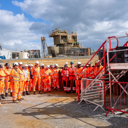 Men stood around a rig.