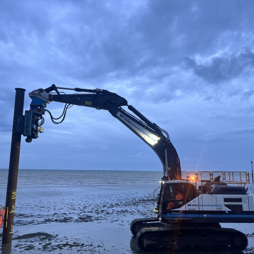 Piling rig installing piles