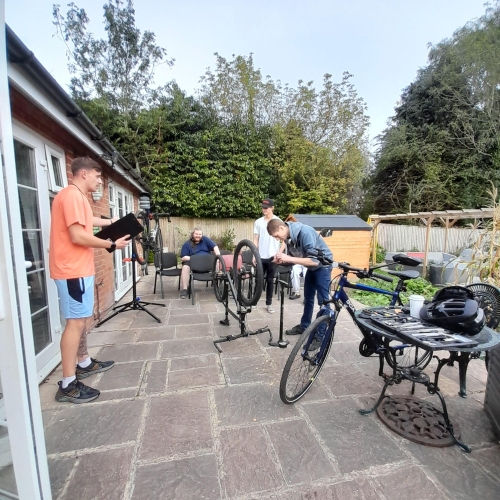 People fixing bikes