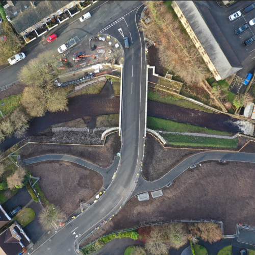 New 21m span bridge following rewidening of river and removal of existing bridge and footbridge.png