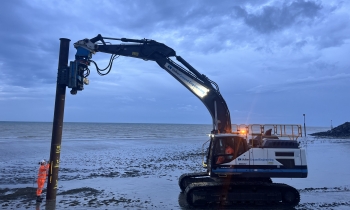 Piling rig installing piles
