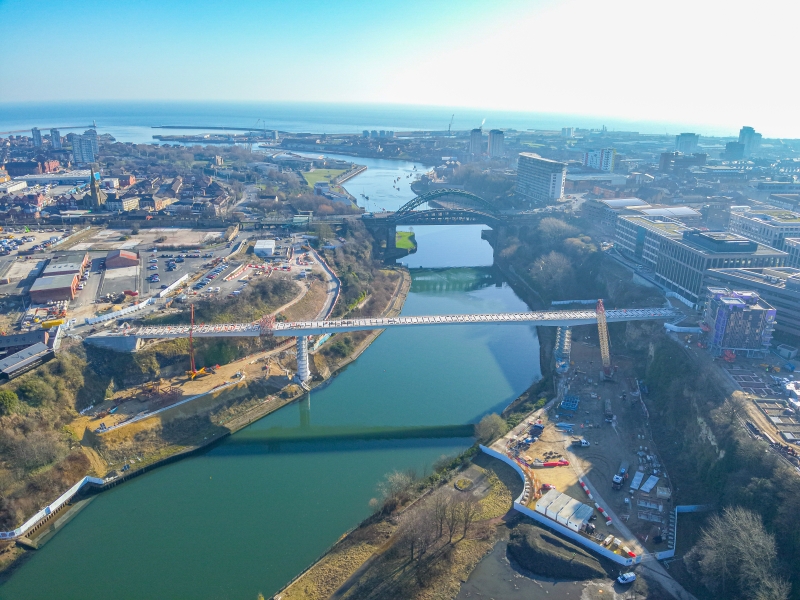 Aerial view of footbridge being built over River Wear