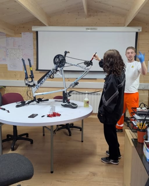 People fixing bikes