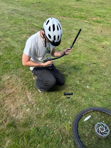 People fixing bikes