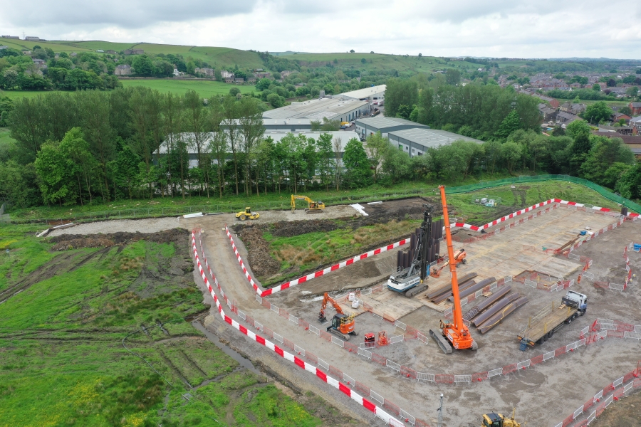 Piling rig installing piles