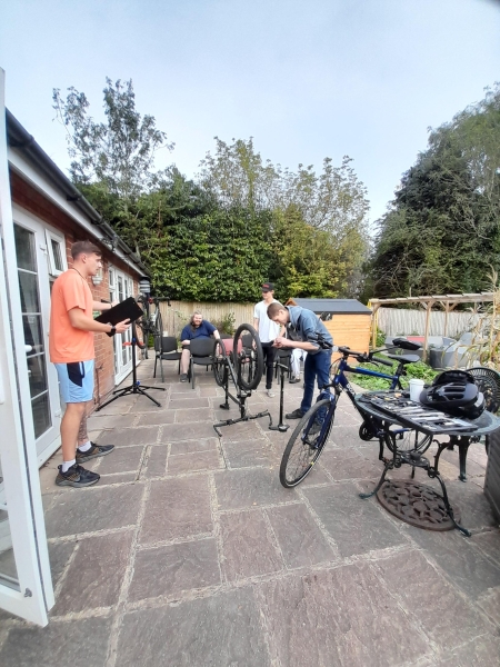People fixing bikes