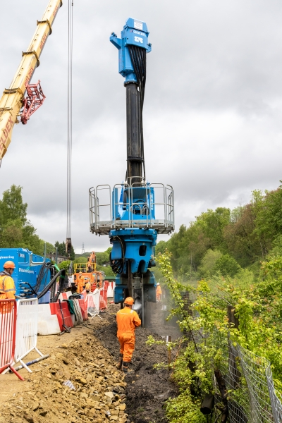 Piling rig installing piles