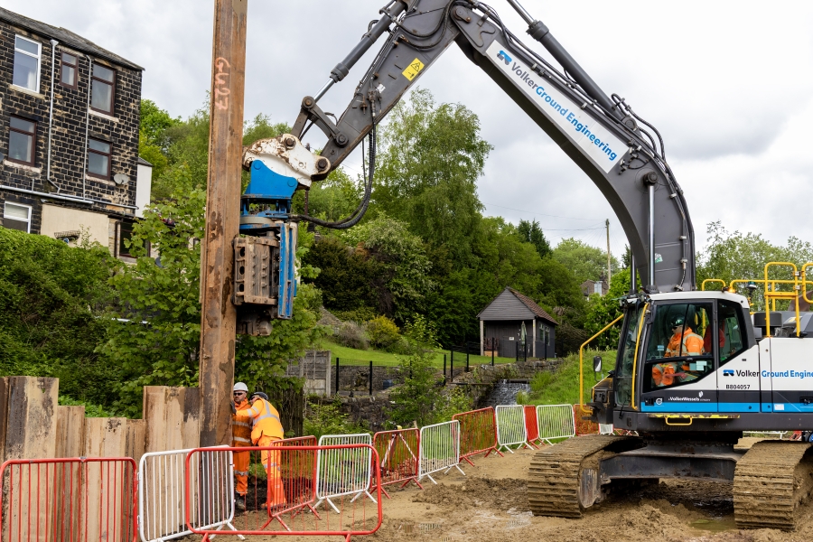 Piling rig installing piles