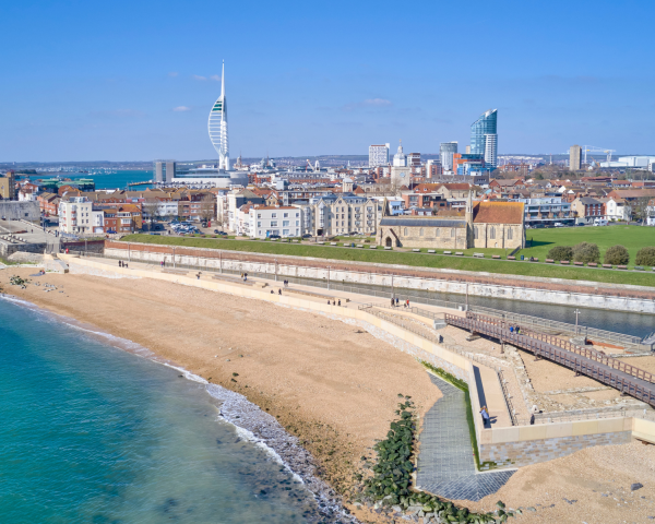 promenade beach front blue sea and blue skies 