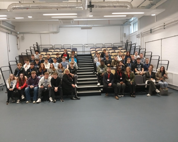 Students sat in a lecture hall.