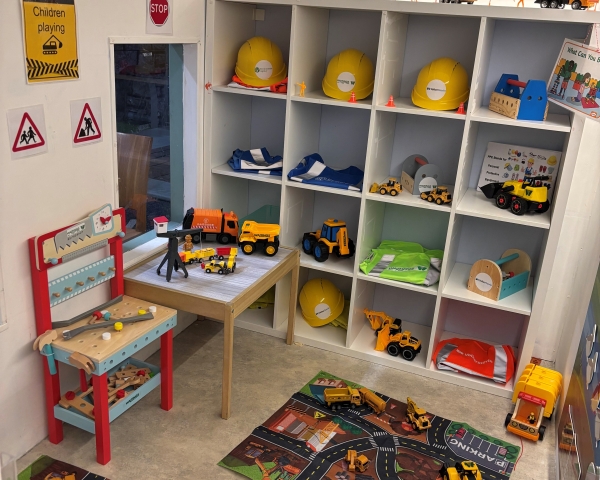 Room filled with construction toys