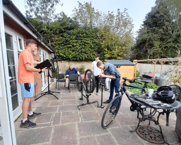 People fixing bikes