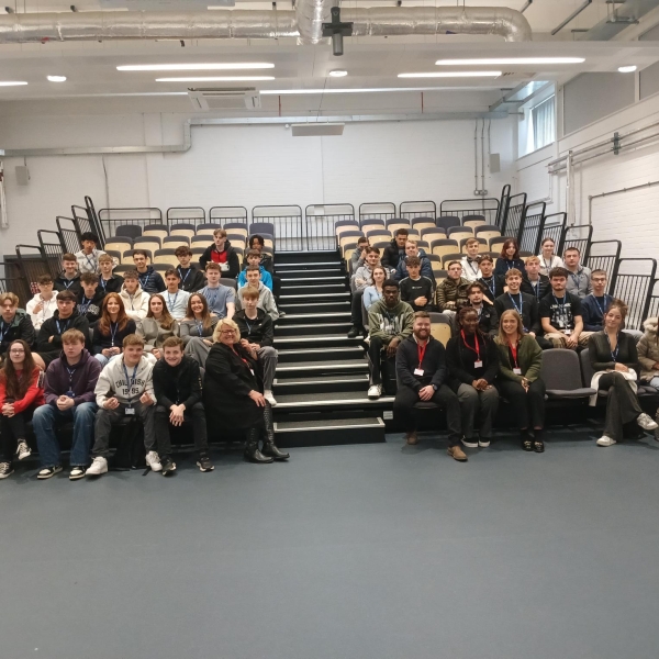 Students sat in a lecture hall.