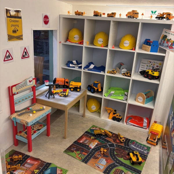 Room filled with construction toys