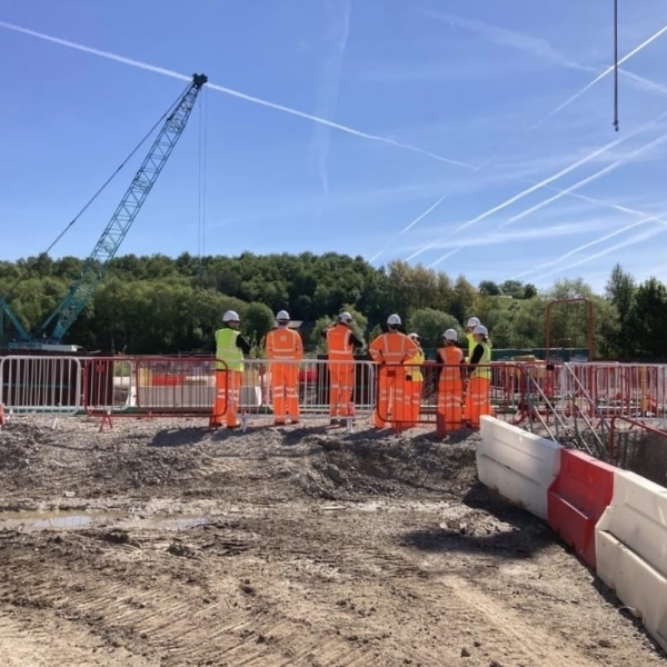 People on site in PPE.