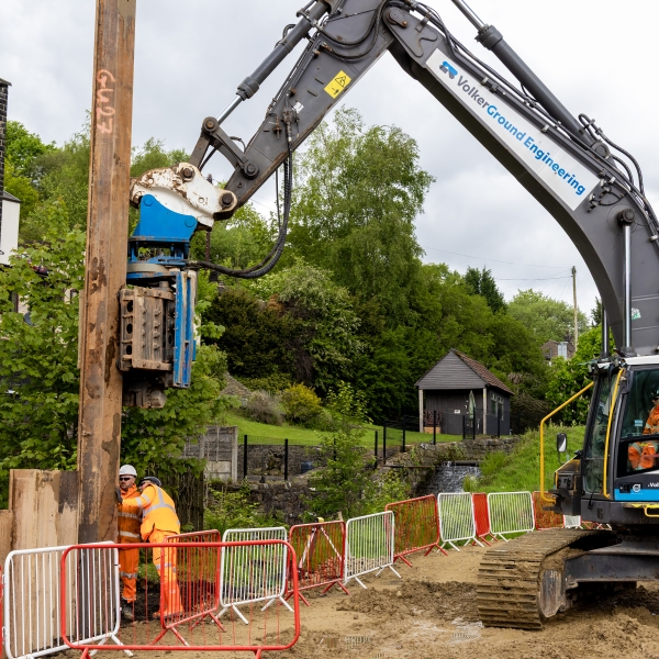 Piling rig installing piles