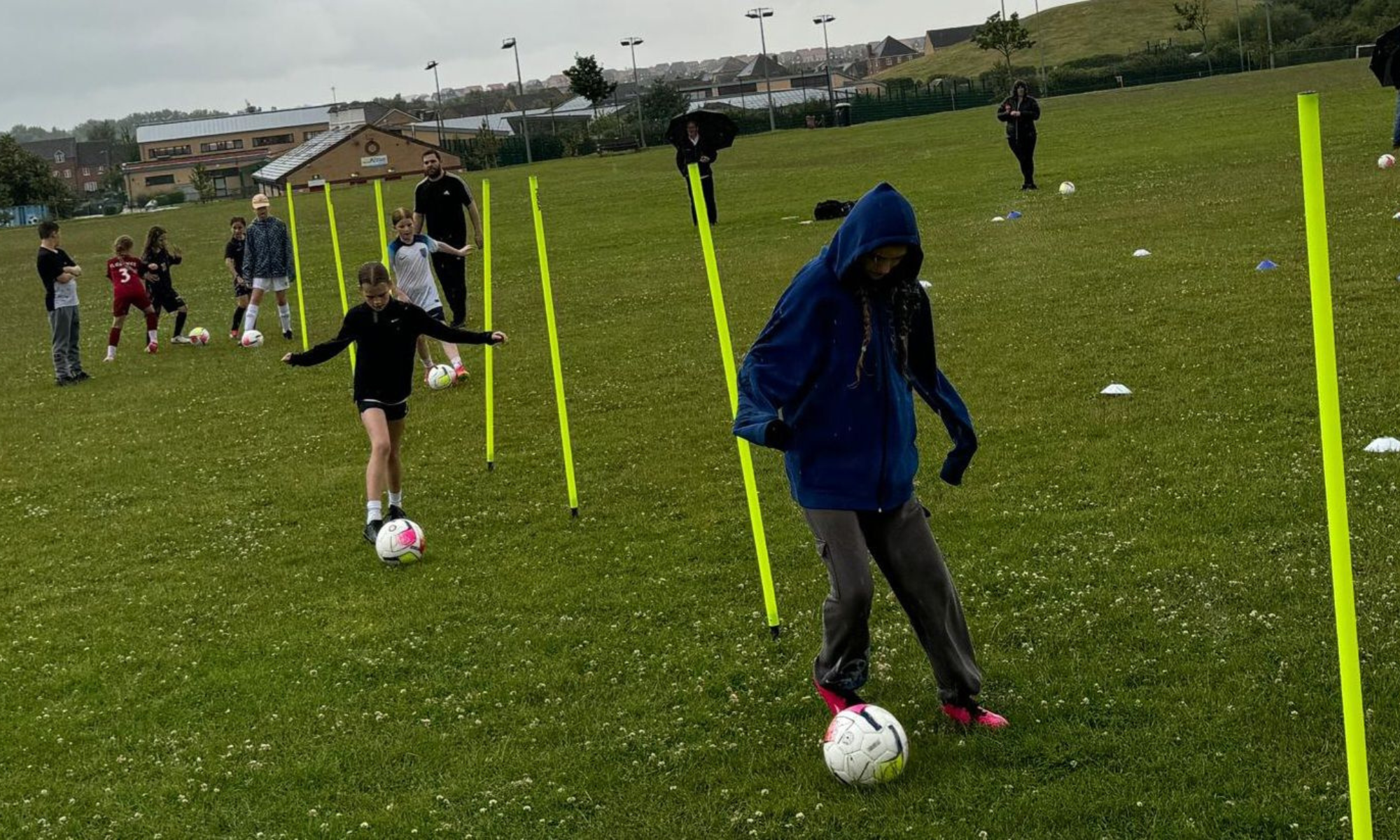 Picture of children playing football.