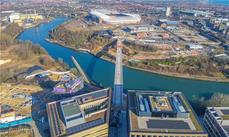 Aerial view of footbridge being built over River Wear