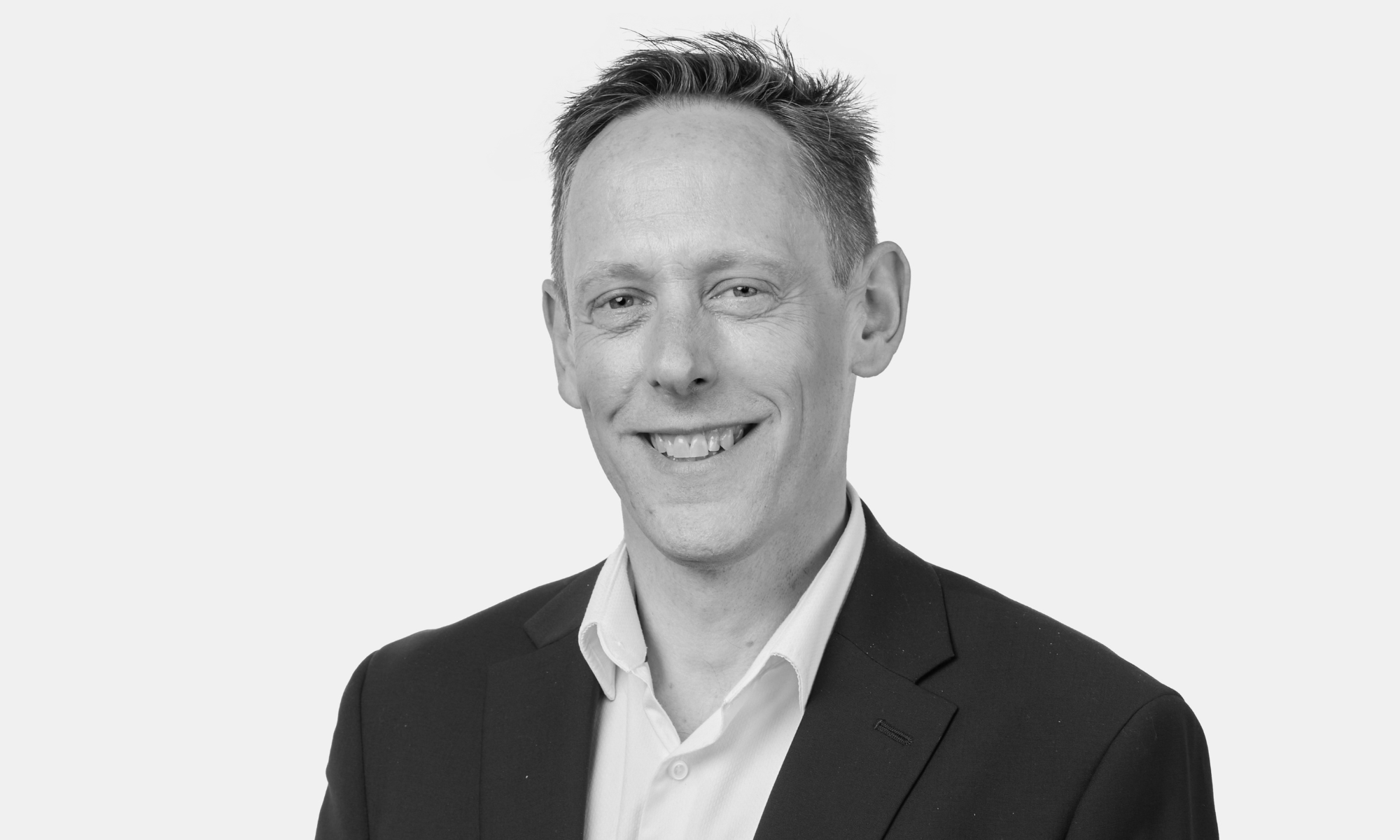 Picture of a man smiling.